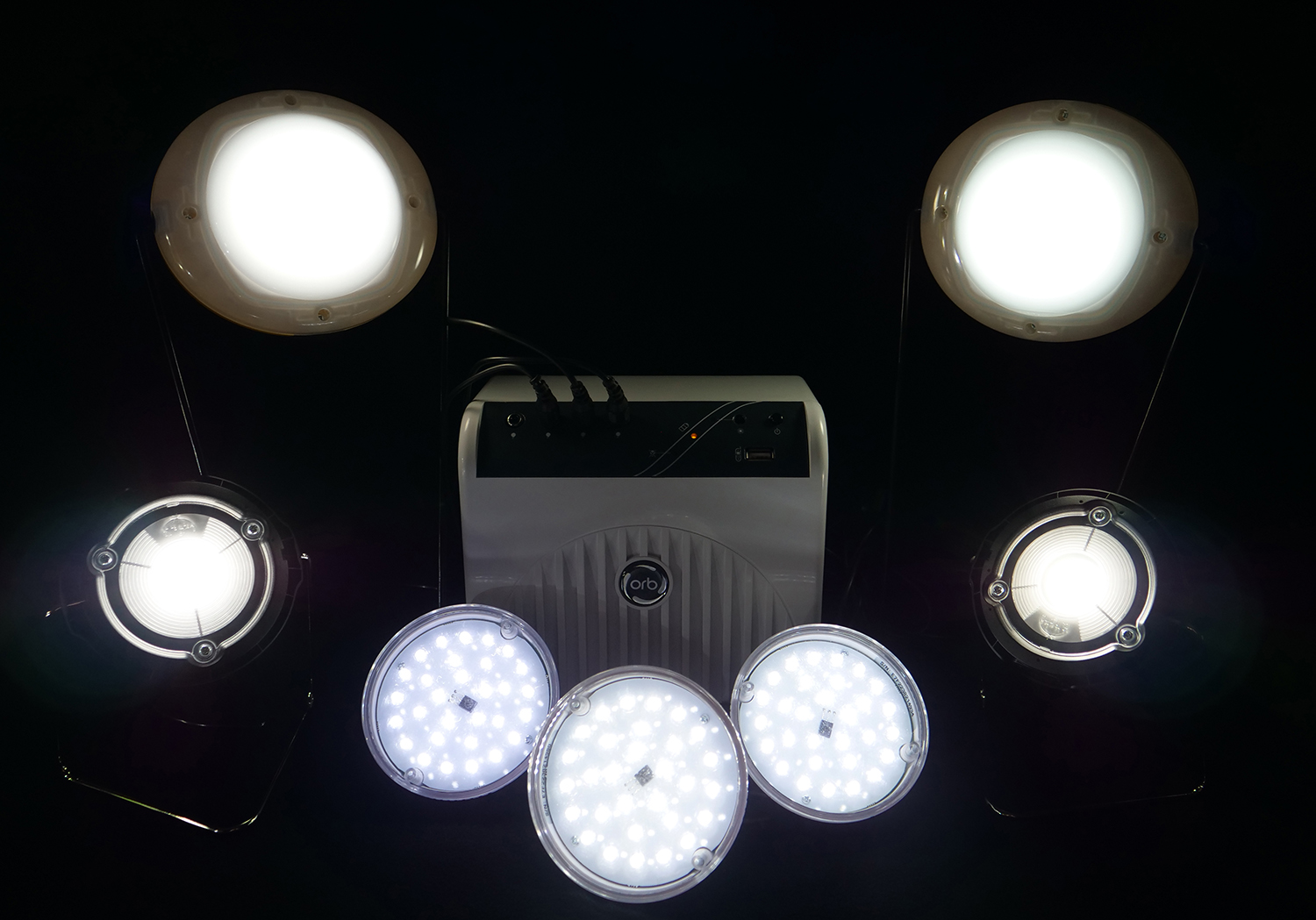 Brightly illuminated LED products sit against a black background.