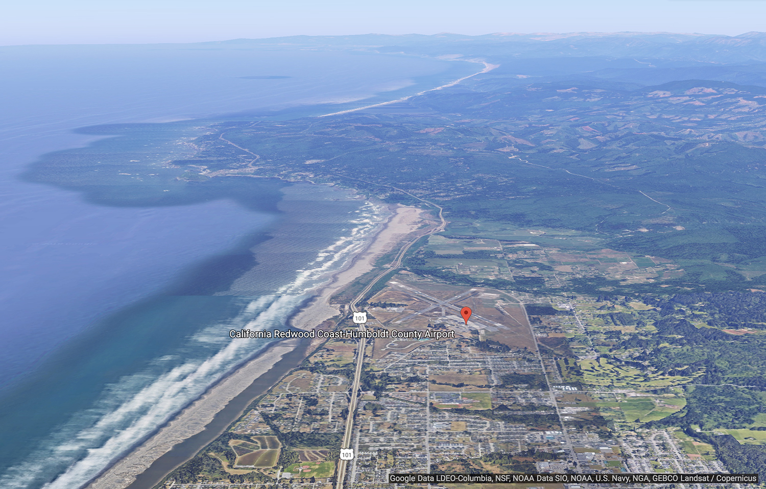 Aerial image of coastline and town of McKinleyville, CA, with airport marked