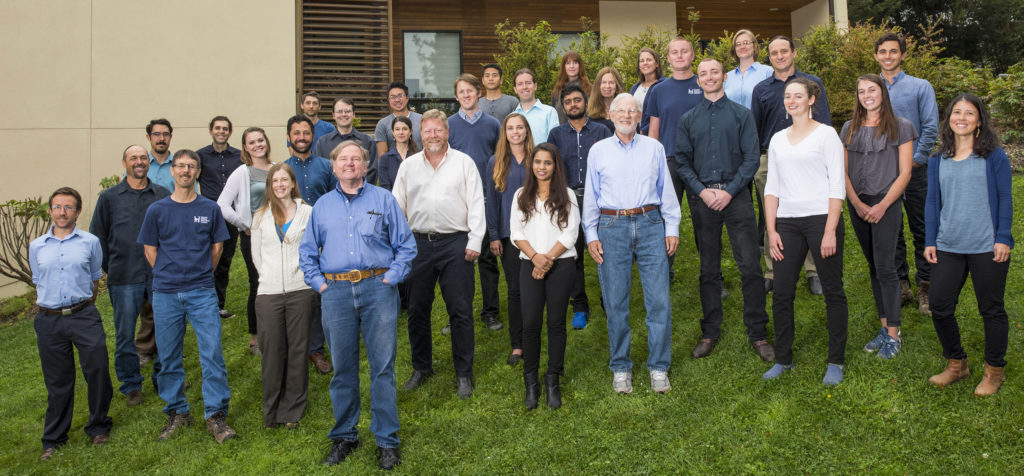 The Schatz team stands on the lawn outside the Center.
