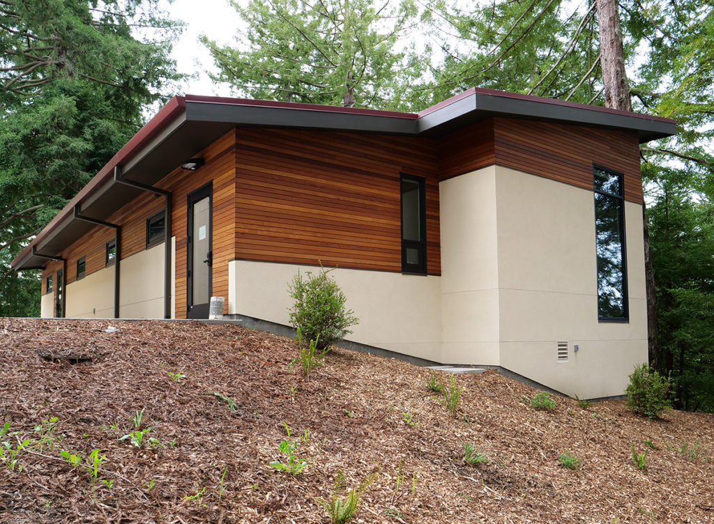 The Schatz Center West Wing is a single story building with a cream base and wood highlights.