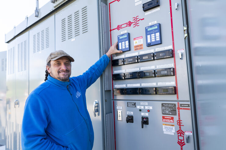 An engineer shows the microgrid control systems