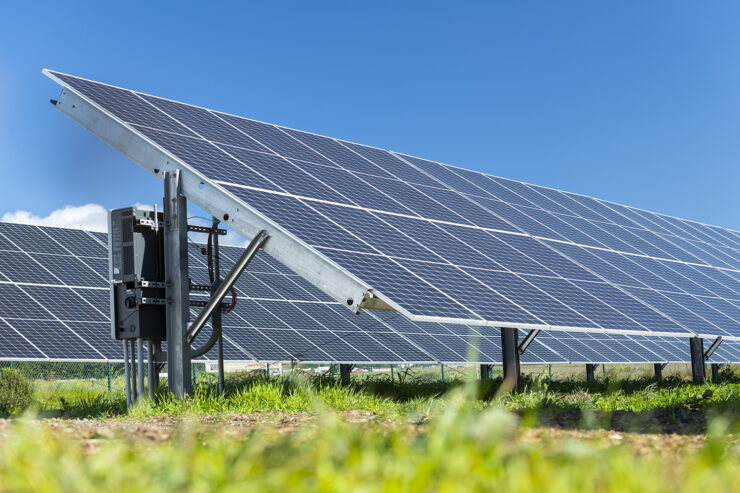 A solar array in a grassy field