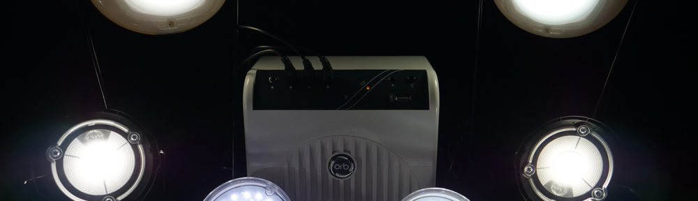 Brightly illuminated LED products sit against a black background.