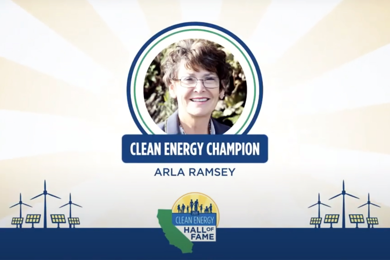 A smiling woman with the caption "Clean Energy Champion: Arla Ramsey" beneath her photo.
