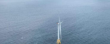 Aerial photo of an offshore wind turbine